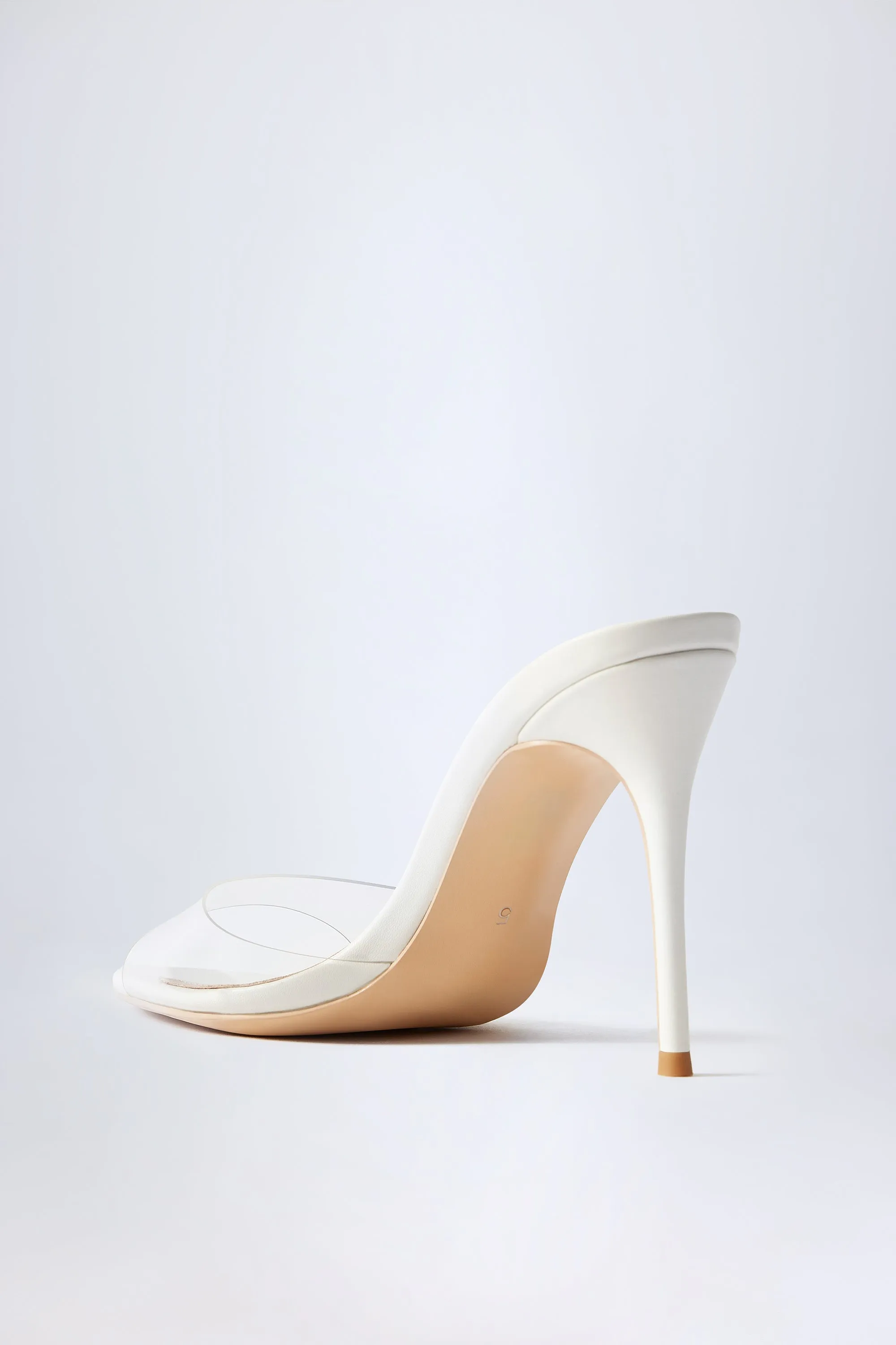 Almond-Toe Heeled Mules in Transparent PVC