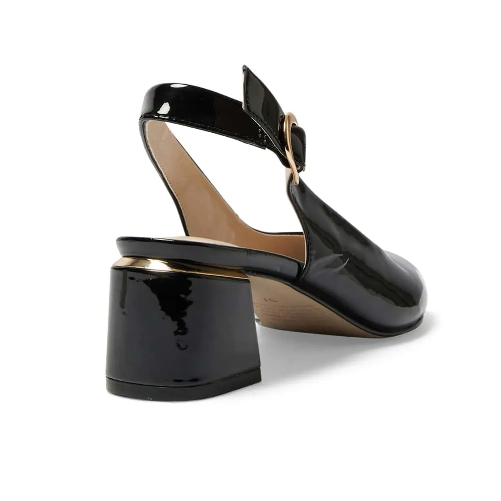 Martina Heel in Black Patent